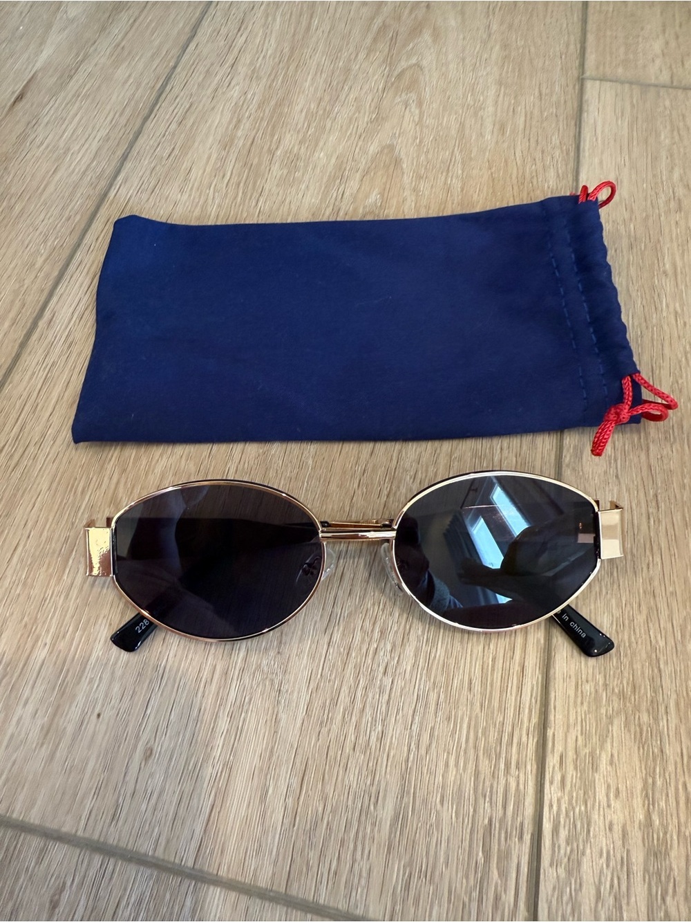 Gold Frame Oval Sunglasses with Navy Pouch